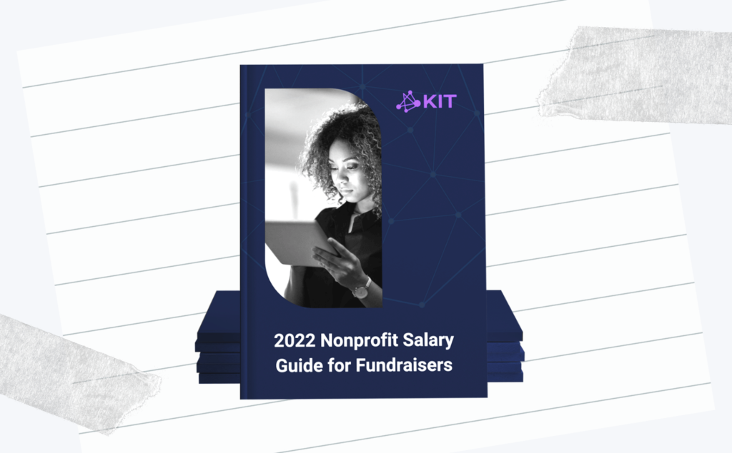 Cover page of the 2022 Fundraising Salaries Guide with a woman looking at the tablet